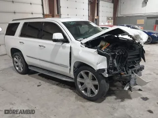 2019 Cadillac Escalade Luxury with VIN 1GYS4BKJXKR206806, listed as a IAAI auction lot 41571123 with 90,278 mi miles. Bid and sale history available at carsss.com. Image 1.