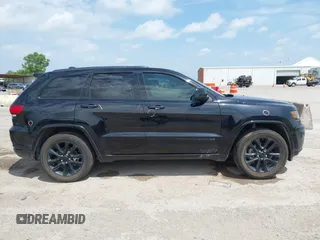2019 Jeep Grand Cherokee Altitude with VIN 1C4RJEAG0KC857787, listed as a IAAI auction lot 42434646 with 193,968 mi miles and . Bid and sale history available at DreamBid. Image 13.