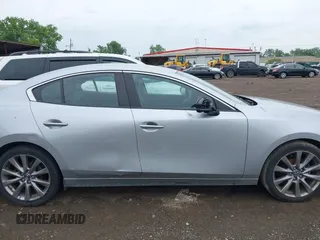 2020 Mazda 3 Select with VIN 3MZBPACL0LM131878, listed as a IAAI auction lot 42274393 with 105,656 mi miles and . Bid and sale history available at DreamBid. Image 13.