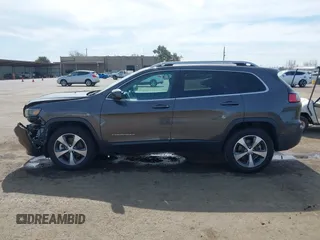 2021 Jeep Cherokee Limited z VIN 1C4PJMDX0MD181058, wystawiony jako IAAI lot #41763166 z przebiegiem 99 123 mil mil oraz . Historia ofert i sprzedaży dostępna na DreamBid. Obrazek 14.