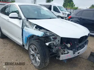 2015 BMW X4 xDrive28i with VIN 5UXXW3C51F0M86668, listed as a IAAI auction lot 42489071 with 59,694 mi miles and . Bid and sale history available at DreamBid. Image 6.