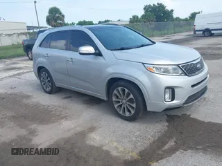 2015 Kia Sorento SX with VIN 5XYKW4A75FG555944, listed as a IAAI auction lot 42693438 with 120,212 mi miles and . Bid and sale history available at DreamBid. Image 1.