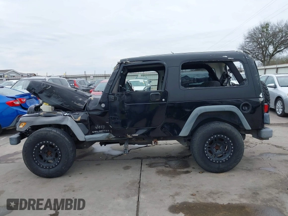 2004 Jeep Wrangler Sport with VIN 1J4FA49S64P794559, listed as a IAAI auction lot 41644201 with 107,445 mi miles. Bid and sale history available at carsss.com. Image 15.