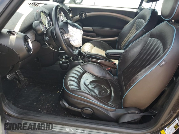 2013 MINI Convertible S with VIN WMWZP3C51DT551373, listed as a Copart auction lot 57878745 with 110,181 mi miles and Salvage title. Bid and sale history available at DreamBid. Image 7.