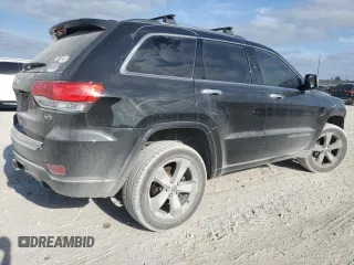 2015 Jeep Grand Cherokee Overland with VIN 1C4RJFCG6FC919637, listed as a Copart auction lot 52072925 with 111,552 mi miles and Salvage Title. Bid and sale history available at carsss.com. Image 3.