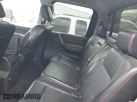 2011 Nissan Titan Pro-4X with VIN 1N6BA0EC3BN320795, listed as a IAAI auction lot 41868113 with 183,919 mi miles and . Bid and sale history available at DreamBid. Image 19.