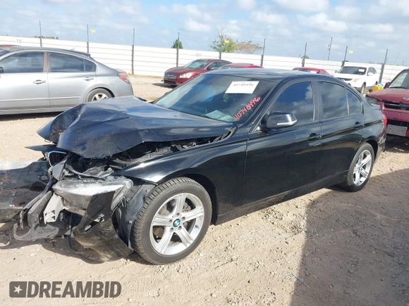2014 BMW 3 Series 328d xDrive with VIN WBA3D5C53EF147095, listed as a IAAI auction lot 40740496 with 98,834 mi miles. Bid and sale history available at carsss.com. Image 2.
