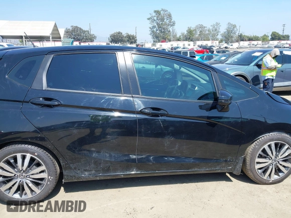 2015 Honda Fit EX-L z VIN 3HGGK5H85FM717646, wystawiony jako IAAI lot #42483387 z przebiegiem 137 296 mil mil oraz . Historia ofert i sprzedaży dostępna na DreamBid. Obrazek 12.