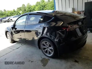2024 Tesla Model Y Long Range z VIN 7SAYGDEEXRF072397, wystawiony jako Copart lot #61157535 z przebiegiem Nie podano mil oraz Szkoda całkowita • Salvage title. Historia ofert i sprzedaży dostępna na DreamBid. Obrazek 2.