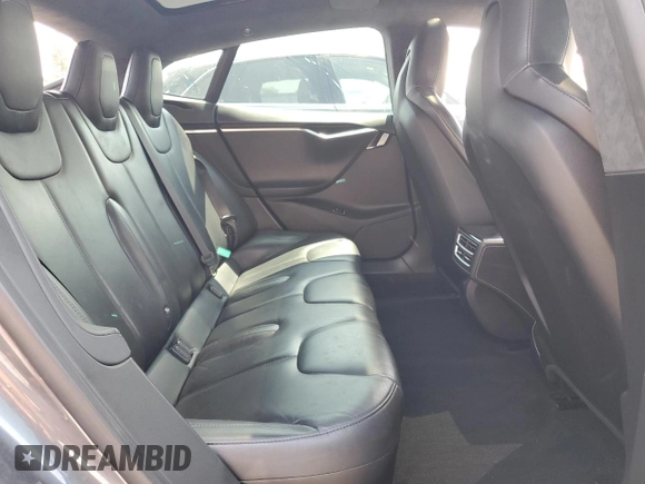 2014 Tesla Model S 60 z VIN 5YJSA1H11EFP64764, wystawiony jako Copart lot #64265815 z przebiegiem 126 191 mil mil oraz Szkoda całkowita • Salvage title. Historia ofert i sprzedaży dostępna na DreamBid. Obrazek 10.