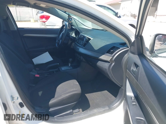 2015 Mitsubishi Lancer ES z VIN JA32U2FU5FU000613, wystawiony jako IAAI lot #42290219 z przebiegiem 138 832 mil mil oraz . Historia ofert i sprzedaży dostępna na DreamBid. Obrazek 5.