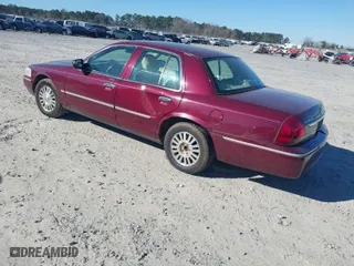 2006 Mercury Grand Marquis LS Premium with VIN 2MEFM75V06X622375, listed as a IAAI auction lot 41686035 with 165,495 mi miles. Bid and sale history available at carsss.com. Image 3.