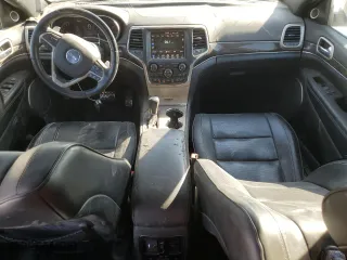 2017 Jeep Grand Cherokee Overland with VIN 1C4RJECG2HC614746, listed as a Copart auction lot 77362304 with 86,330 mi miles and Salvage Title. Bid and sale history available at carsss.com. Image 8.