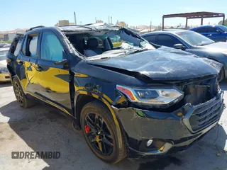 2020 Chevrolet Traverse Premier z VIN 1GNERKKW4LJ282612, wystawiony jako IAAI lot #42313667 z przebiegiem 90 922 mil mil oraz . Historia ofert i sprzedaży dostępna na DreamBid. Obrazek 1.
