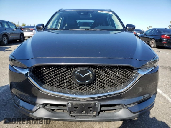2019 Mazda CX-5 Grand Touring with VIN JM3KFADM2K0665356, listed as a Copart auction lot 51886685 with 44,760 mi miles and Salvage Title. Bid and sale history available at carsss.com. Image 5.