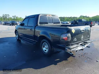 2001 Ford F-150 SuperCrew XLT with VIN 1FTRW07W41KA13131, listed as a IAAI auction lot 41922077 with 1 mi miles. Bid and sale history available at carsss.com. Image 3.
