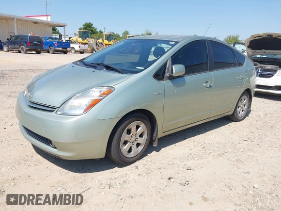 2007 Toyota Prius with VIN JTDKB20U977548064, listed as a IAAI auction lot 42040952 with 197,934 mi miles. Bid and sale history available at carsss.com. Image 2.