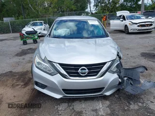 2018 Nissan Altima SR with VIN 1N4AL3AP0JC188288, listed as a IAAI auction lot 41996765 with 86,256 mi miles and . Bid and sale history available at DreamBid. Image 12.