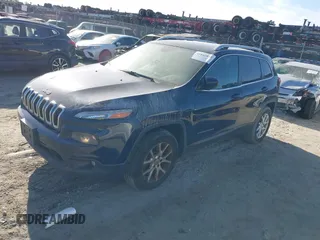 2014 Jeep Cherokee Altitude with VIN 1C4PJMCB6EW230078, listed as a IAAI auction lot 41842841 with 171,000 mi miles. Bid and sale history available at carsss.com. Image 2.