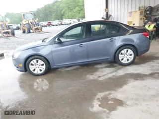 2013 Chevrolet Cruze LS with VIN 1G1PA5SH3D7230973, listed as a IAAI auction lot 41974483 with 137,248 mi miles. Bid and sale history available at carsss.com. Image 2.