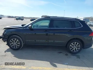 2019 Volkswagen Tiguan SE with VIN 3VV2B7AX6KM066013, listed as a IAAI auction lot 41854035 with 72,322 mi miles and . Bid and sale history available at DreamBid. Image 14.