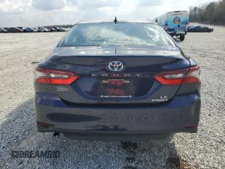 2021 Toyota Camry Hybrid LE with VIN 4T1C31AK9MU557171, listed as a Copart auction lot 48637275 with 77,193 mi miles and Salvage Title. Bid and sale history available at carsss.com. Image 6.