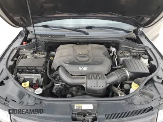 2014 Jeep Grand Cherokee Overland with VIN 1C4RJFCG9EC572237, listed as a Copart auction lot 53864865 with 90,657 mi miles and Salvage Title. Bid and sale history available at DreamBid. Image 12.