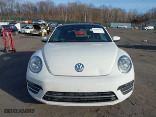 2019 Volkswagen Beetle SE with VIN 3VWJD7AT6KM713525, listed as a IAAI auction lot 41508195 with 73,360 mi miles. Bid and sale history available at carsss.com. Image 12.