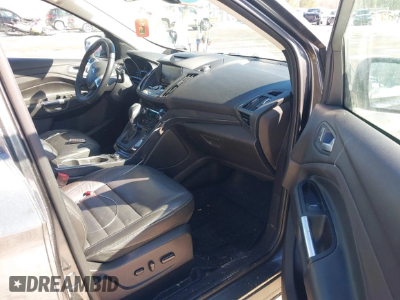 2015 Ford Escape Titanium with VIN 1FMCU9JX6FUB86304, listed as a IAAI auction lot 41595761 with 104,317 mi miles and . Bid and sale history available at DreamBid. Image 5.
