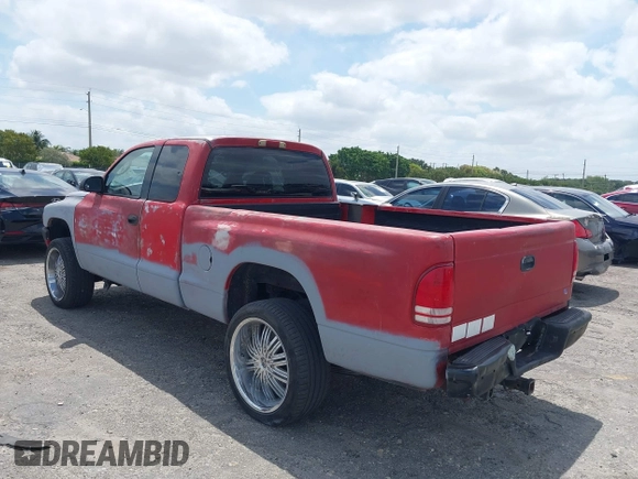 2002 Dodge Dakota Sport with VIN 1B7GL32X82S632091, listed as a IAAI auction lot 42091290 with 206,721 mi miles and . Bid and sale history available at carsss.com. Image 3.