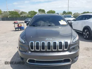 2014 Jeep Cherokee Limited with VIN 1C4PJLDBXEW183095, listed as a IAAI auction lot 41814496 with 89,589 mi miles and . Bid and sale history available at DreamBid. Image 12.