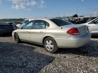 2005 Ford Taurus SE with VIN 1FAFP53U95A101336, listed as a Copart auction lot 56457095 with 127,656 mi miles and Salvage title. Bid and sale history available at DreamBid. Image 2.