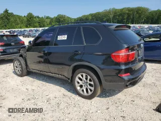 2012 BMW X5 35i with VIN 5UXZV4C57CL756062, listed as a Copart auction lot 65752145 with 160,860 mi miles and Clean title. Bid and sale history available at DreamBid. Image 2.