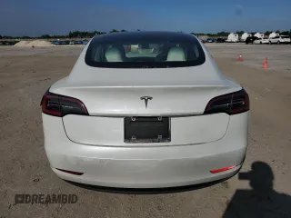 2021 Tesla Model 3 Standard Range Plus with VIN 5YJ3E1EA4MF089259, listed as a Copart auction lot 75398924 with 32,166 mi miles and Salvage Title. Bid and sale history available at DreamBid. Image 6.