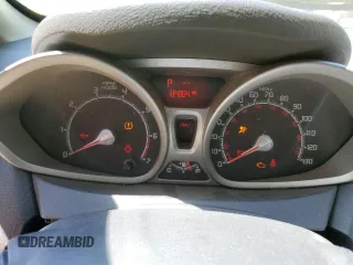 2012 Ford Fiesta SE z VIN 3FADP4BJ7CM164850, wystawiony jako Copart lot #51680925 z przebiegiem 184 884 mil mil oraz Szkoda całkowita • Salvage title. Historia ofert i sprzedaży dostępna na DreamBid. Obrazek 9.