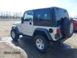 2006 Jeep Wrangler X with VIN 1J4FA39S16P787614, listed as a IAAI auction lot 41992315 with 61,788 mi miles. Bid and sale history available at carsss.com. Image 3.