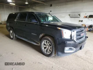 2015 GMC Yukon XL SLT z VIN 1GKS2HKC2FR135014, wystawiony jako Copart lot #55477295 z przebiegiem 144 101 mil mil oraz Czysty tytuł • Clean title. Historia ofert i sprzedaży dostępna na DreamBid. Obrazek 4.