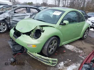 2003 Volkswagen New Beetle Coupe GLS with VIN 3VWCD21C23M415115, listed as a IAAI auction lot 41288921 with 67,656 mi miles. Bid and sale history available at carsss.com. Image 2.