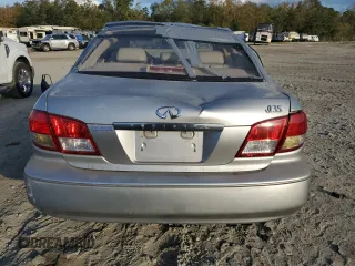 2002 Infiniti I35 Luxury z VIN JNKDA31A32T015213, wystawiony jako Copart lot #78977614 z przebiegiem 208 434 mil mil oraz Szkoda całkowita • Salvage title. Historia ofert i sprzedaży dostępna na DreamBid. Obrazek 6.