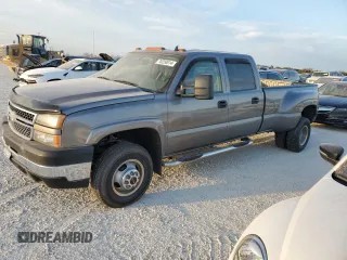 2006 Chevrolet Silverado 3500 DRW LT1 with VIN 1GCJK33DX6F142117, listed as a Copart auction lot 76250014 with 0 mi miles and Salvage Title. Bid and sale history available at carsss.com. Image 1.