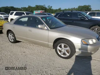 2001 Mazda Millenia z VIN JM1TA221911716600, wystawiony jako Copart lot #57639185 z przebiegiem 86 947 mil mil oraz Tytuł czysty. Historia ofert i sprzedaży dostępna na DreamBid. Obrazek 4.