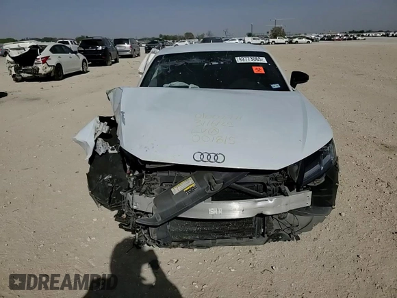 2018 Audi TT z VIN TRUC5AFV3J1001815, wystawiony jako Copart lot #49773065 z przebiegiem Nie podano mil oraz Szkoda całkowita • Salvage title. Historia ofert i sprzedaży dostępna na DreamBid. Obrazek 11.