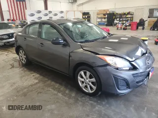 2011 Mazda 3 i Touring z VIN JM1BL1VG5B1376217, wystawiony jako Copart lot #56741595 z przebiegiem 133 501 mil mil oraz Szkoda całkowita • Salvage title. Historia ofert i sprzedaży dostępna na DreamBid. Obrazek 4.