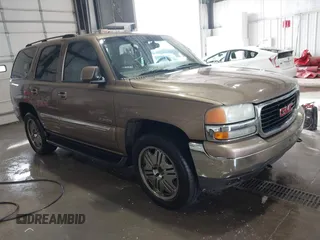 2004 GMC Yukon SLT with VIN 1GKEK13Z84R265500, listed as a IAAI auction lot 41412544 with 259,575 mi miles. Bid and sale history available at carsss.com. Image 1.