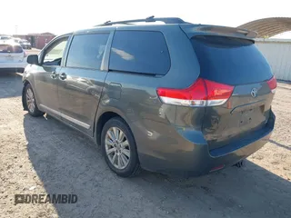 2012 Toyota Sienna LE with VIN 5TDJK3DCXCS039801, listed as a IAAI auction lot 41483248 with 165,548 mi miles. Bid and sale history available at carsss.com. Image 3.