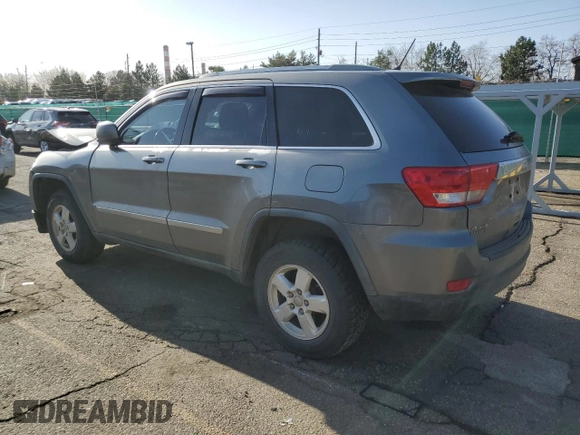 2011 Jeep Grand Cherokee Laredo with VIN 1J4RR4GG5BC578257, listed as a Copart auction lot 52393825 with 244,554 mi miles and Salvage Title. Bid and sale history available at carsss.com. Image 2.