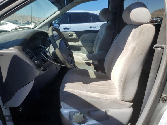 2000 Toyota Sienna CE with VIN 4T3GF19C9YU272554, listed as a Copart auction lot 73125134 with 240,998 mi miles and Salvage Title. Bid and sale history available at carsss.com. Image 7.