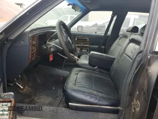 1990 Cadillac Brougham z VIN 1G6DW5472LR719564, wystawiony jako Copart lot #71634744 z przebiegiem Nie podano mil oraz Tytuł czysty. Historia ofert i sprzedaży dostępna na DreamBid. Obrazek 7.