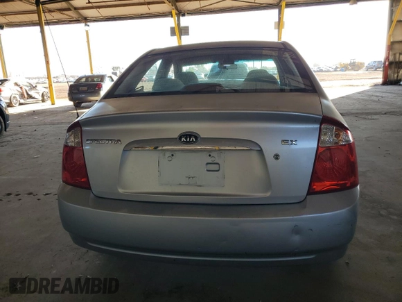 2006 Kia Spectra EX with VIN KNAFE121465332510, listed as a Copart auction lot 77211974 with 148,964 mi miles and Salvage Title. Bid and sale history available at carsss.com. Image 6.