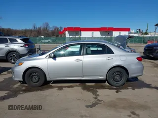 2011 Toyota Corolla L with VIN 2T1BU4EE9BC597358, listed as a IAAI auction lot 41815778 with 142,747 mi miles. Bid and sale history available at carsss.com. Image 14.